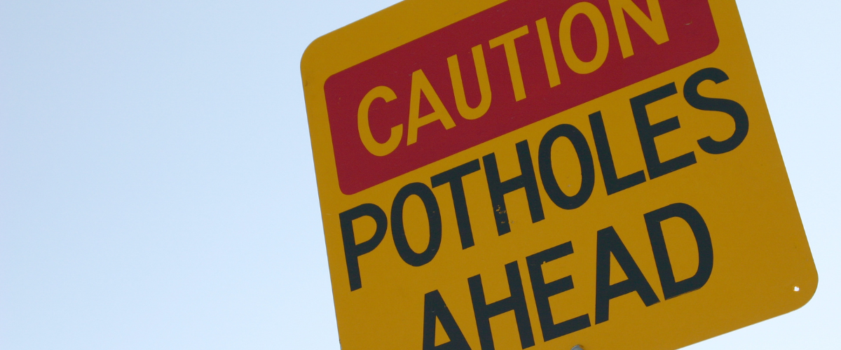 Preventing Pothole Damage: Tips for Avoiding & Reporting Potholes